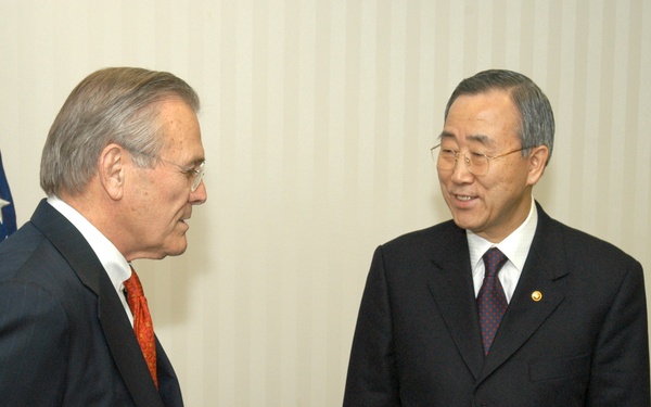 Secretary Rumsfeld talks informally with South Korean Minister of Foreign Affairs and Trade Ban Ki-moon.