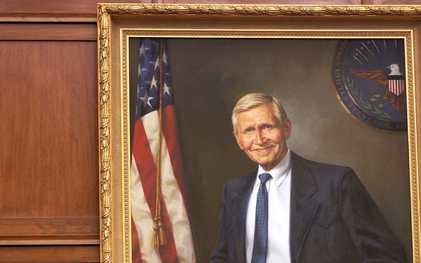 Secretary of Defense Rumsfeld and Rep. Ike Skelton (D-Mo.) talk informally.