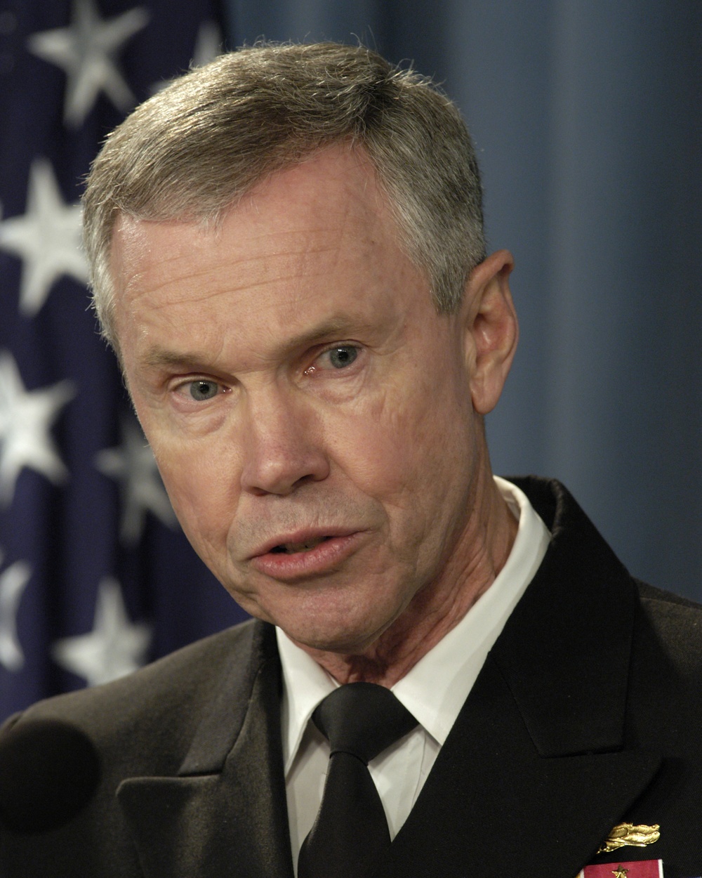 Rear Adm. William D. Sullivan responds to a reporter's question.