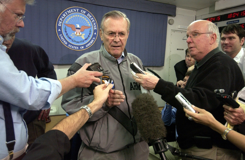 Secretary of Defense Donald H. Rumsfeld talks with members of the press.