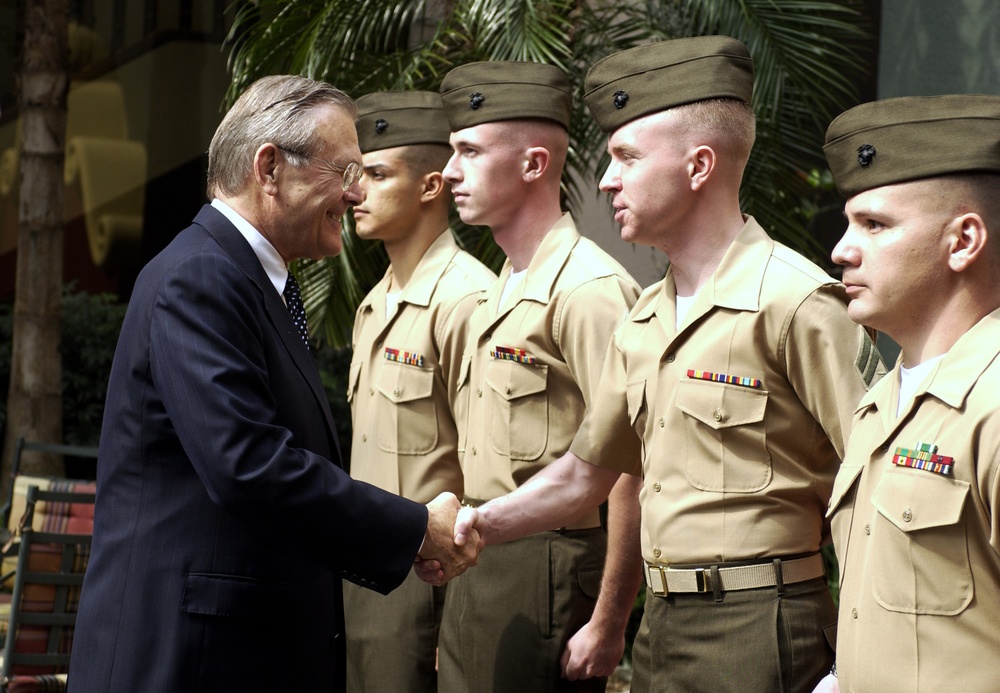 Secretary Rumsfeld meets with U.S. Marines from the Marine Security Guard Detachment.