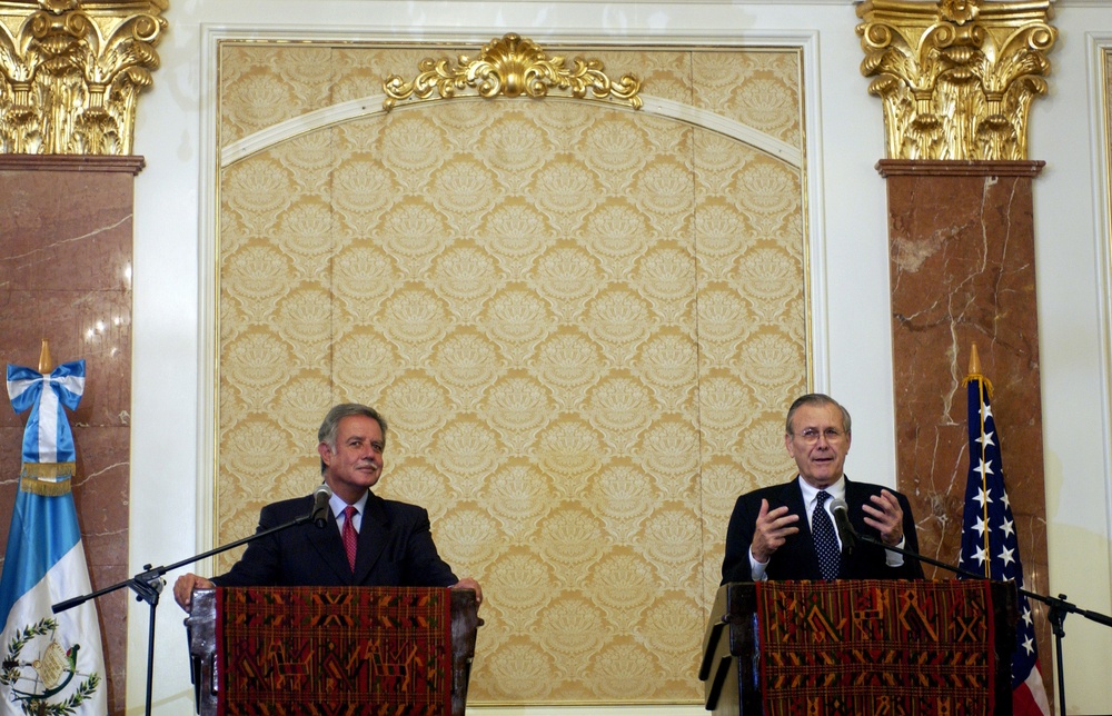 Secretary Rumsfeld answers a reporter's question during joint press conference.