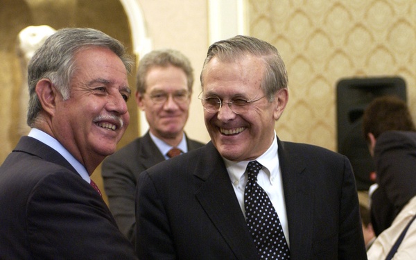 Secretary Rumsfeld and Guatemalan President Oscar Jose Rafael Berger Perdomo shake hands.