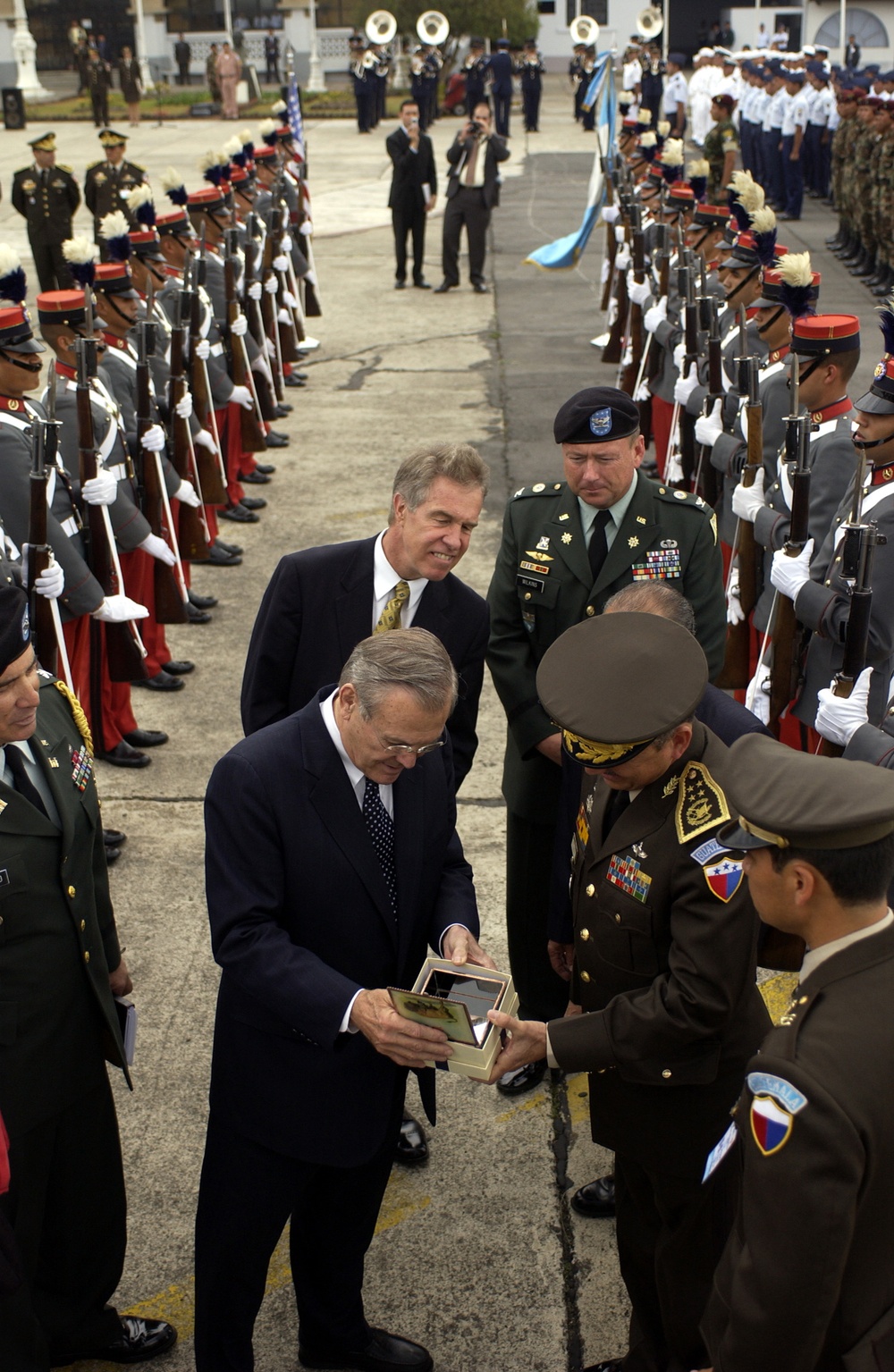 Secretary Rumsfeld presents a gift to Guatemalan Minister of Defense Brig. Gen. Carlos Humberto Aldana Villanueva.