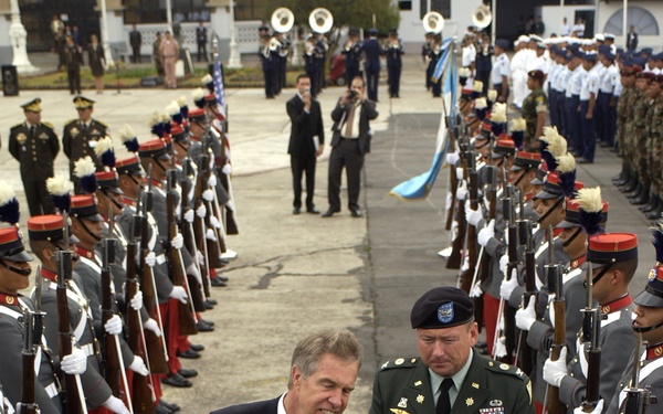 Secretary Rumsfeld presents a gift to Guatemalan Minister of Defense Brig. Gen. Carlos Humberto Aldana Villanueva.