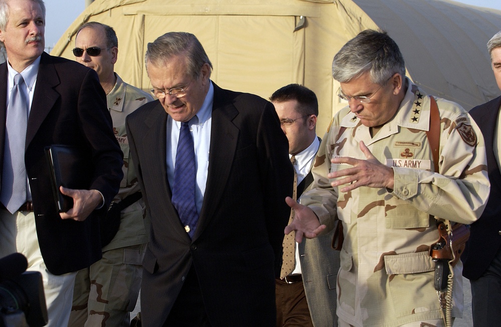 Gen. George Casey, U.S. Army, talks with Secretary of Defense Donald H. Rumsfeld.