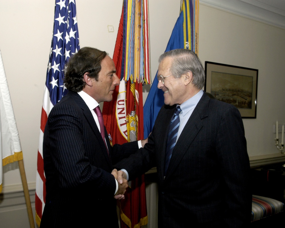 Secretary Rumsfeld congratulates former Portuguese Minister of Defense Paulo Portas.