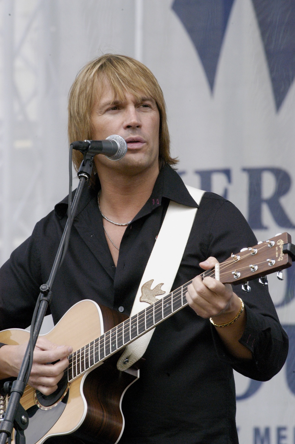 Country singer Rockie performs at the America Supports You concert in the Pentagon center courtyard.