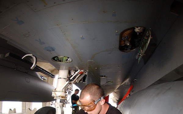 U.S. Air Force Staff Sgt. Justin Fears checks fluid levels.