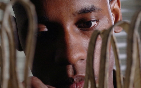 Airman 1st Class Chad Bowen inspects C-17 Globemaster III aircraft instrumentation and navigation systems batteries.