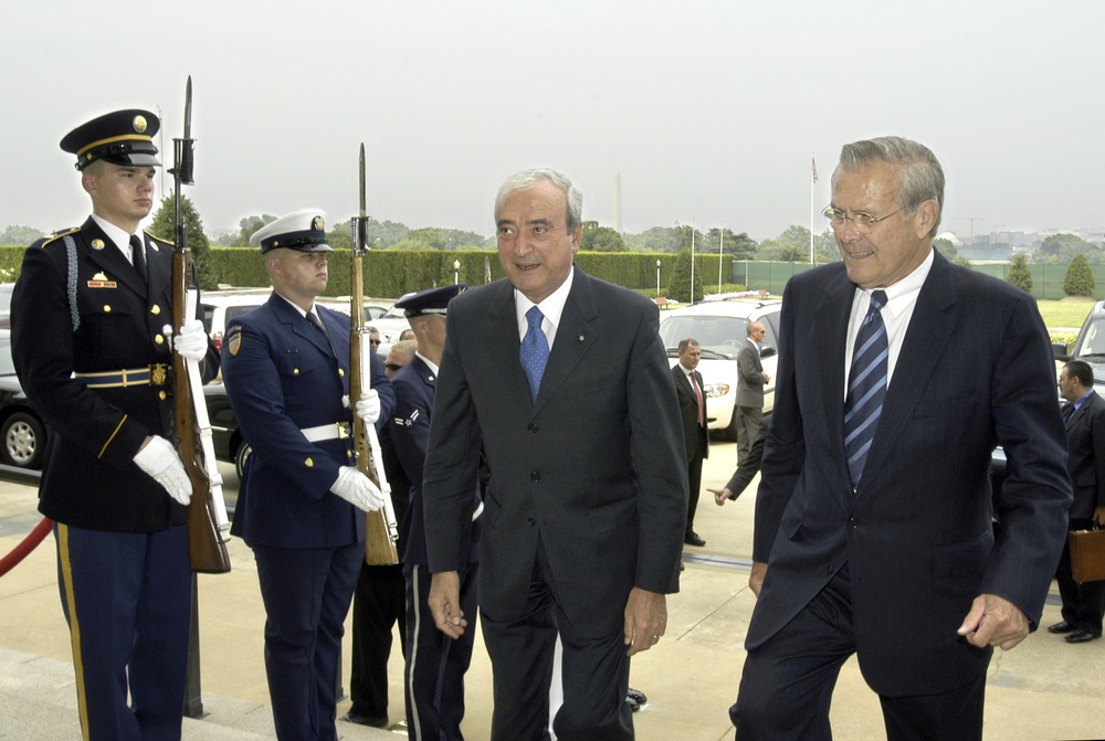 Secretary Rumsfeld escorts Italian Minister of Defense Antonio Martino into the Pentagon.