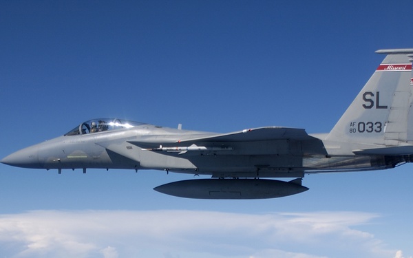 The pilot of an Air Force F-15 Eagle fires an AIM-120 Advanced Medium Range Air-to-Air Missile.