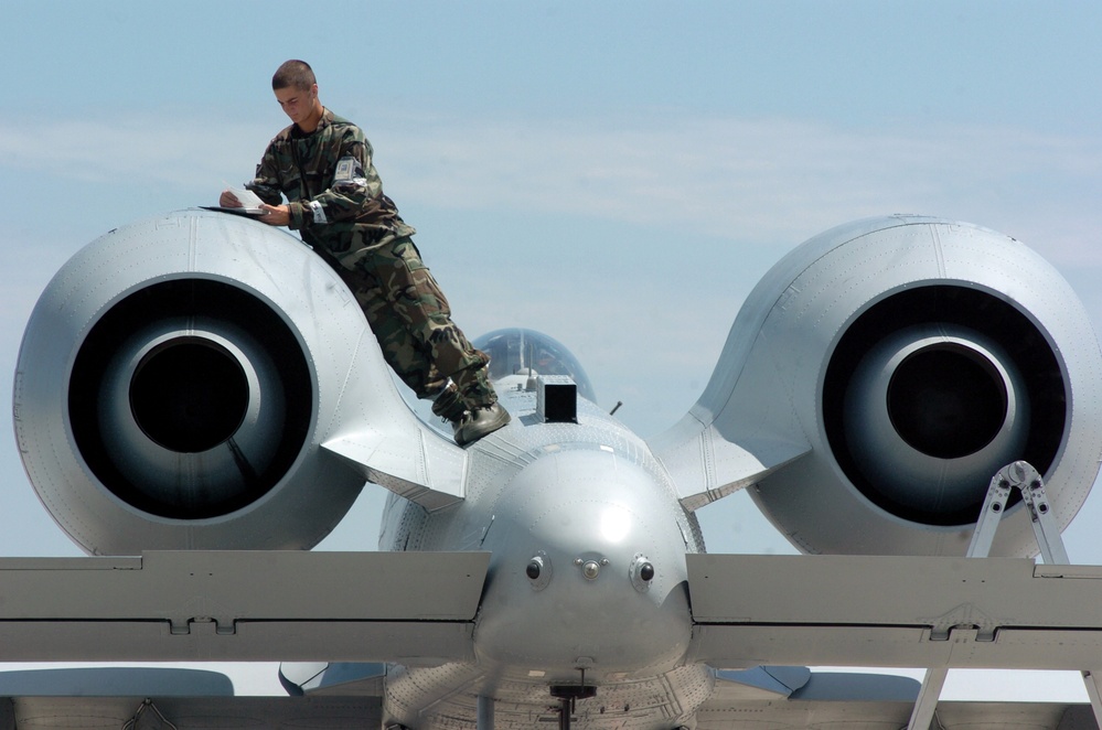 Airman 1st Class Chad Ferguson works on an engine nacelle of an A-10 Thunderbolt II.