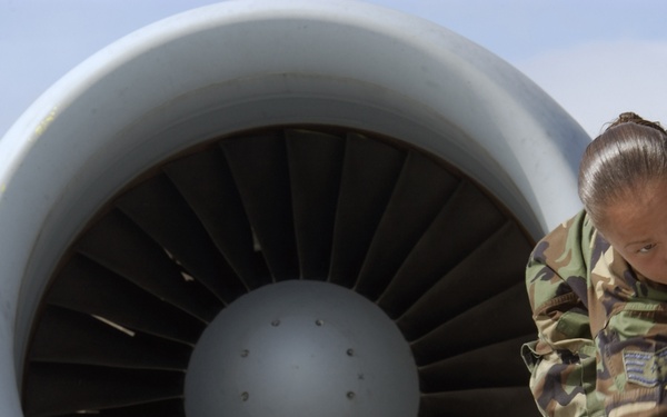 A-10 Thunderbolt II crew chief Staff Sgt. Jennifer Niblick wipes down the side of an A-10.