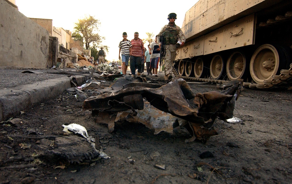 U.S. Army soldiers secure a street known as Route Predators.