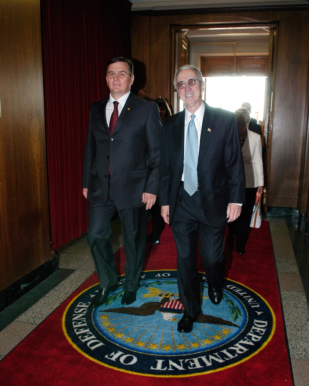 Acting Deputy Secretary of Defense Gordon England escorts Moldovan Minister of Defense Valeriu Plesca into the Pentagon.