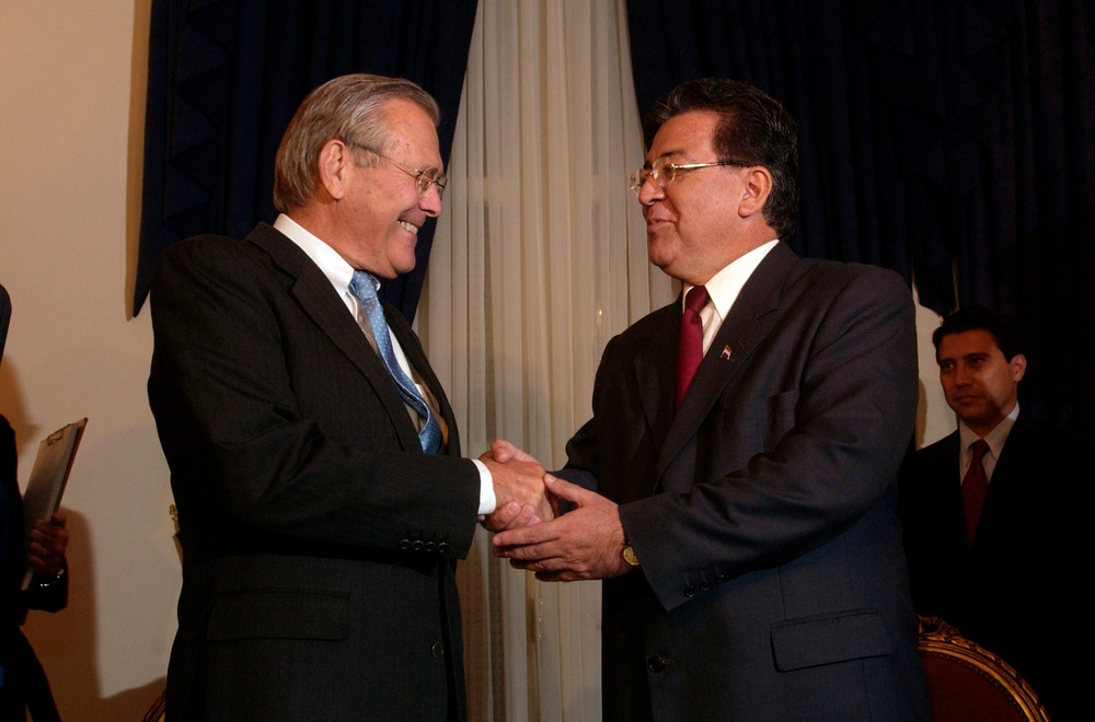 Paraguayan President Nicanor Duarte-Frutos greets Secretary of Defense Donald H. Rumsfeld.