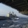 The Navy guided missile cruiser USS Chancellorsville (CG 62) comes alongside.