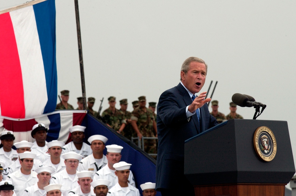 President George W. Bush addresses the audience at a ceremony.