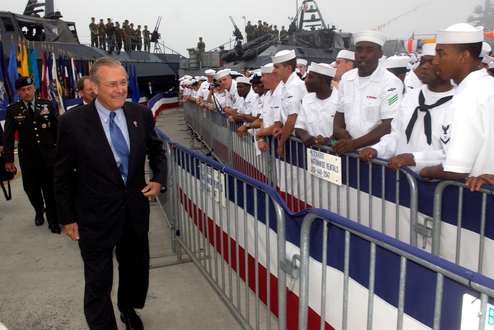 Secretary of Defense Donald H. Rumsfeld greets U.S. Navy sailors.