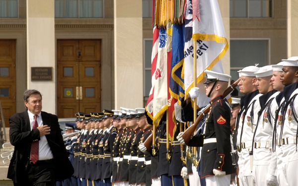 Rep. Duncan Hunter is escorted by Col. Robert Pricone as he inspects the joint services honor guard.