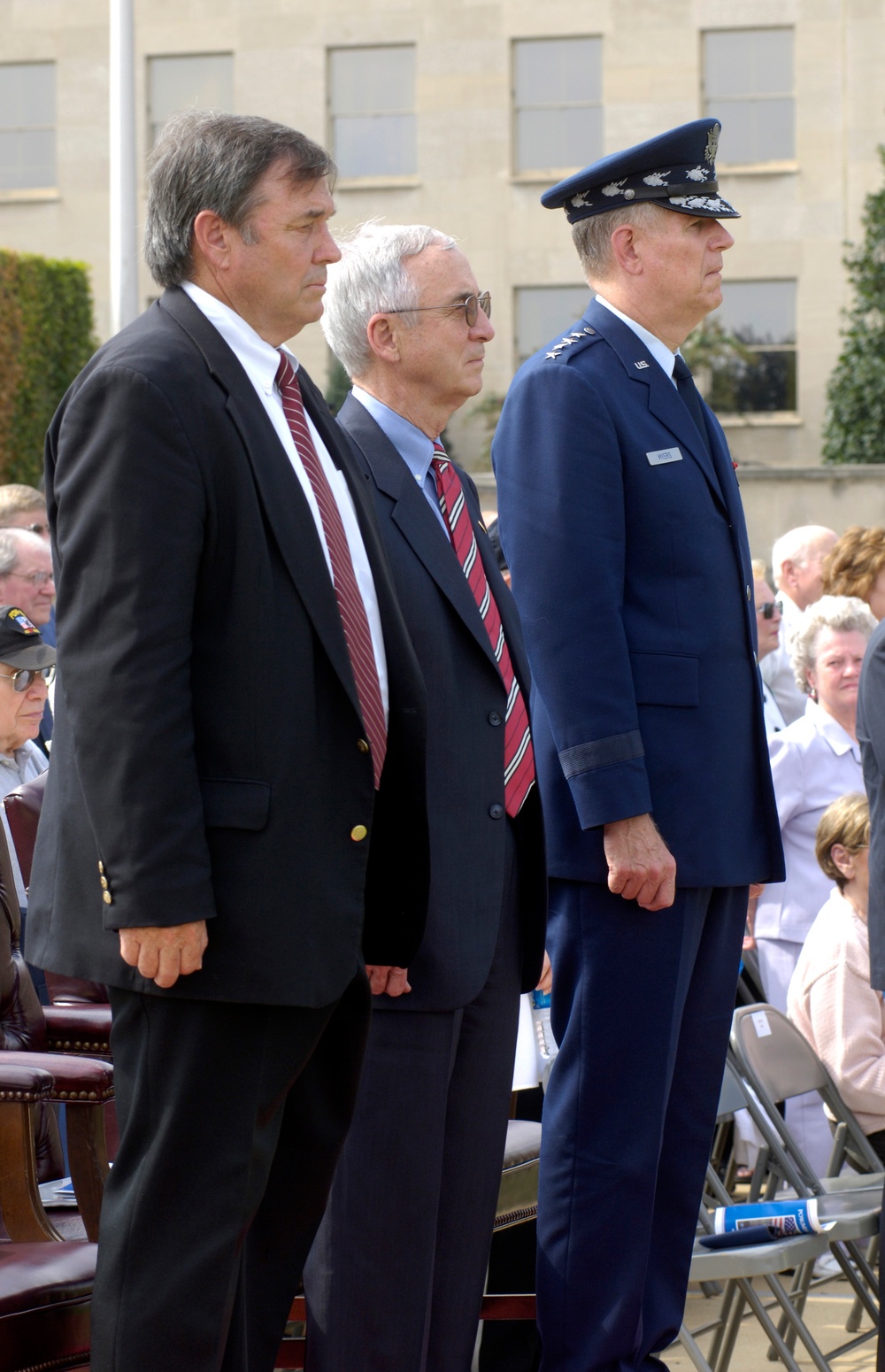 Rep. Duncan Hunter, Acting Deputy Secretary England  and Gen. Myers watch as members of the joint service honor guard pass in review.