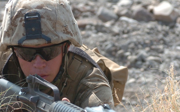 U.S. Marine Corps Pfc. Brandan Smith makes use of what little cover there is while training.