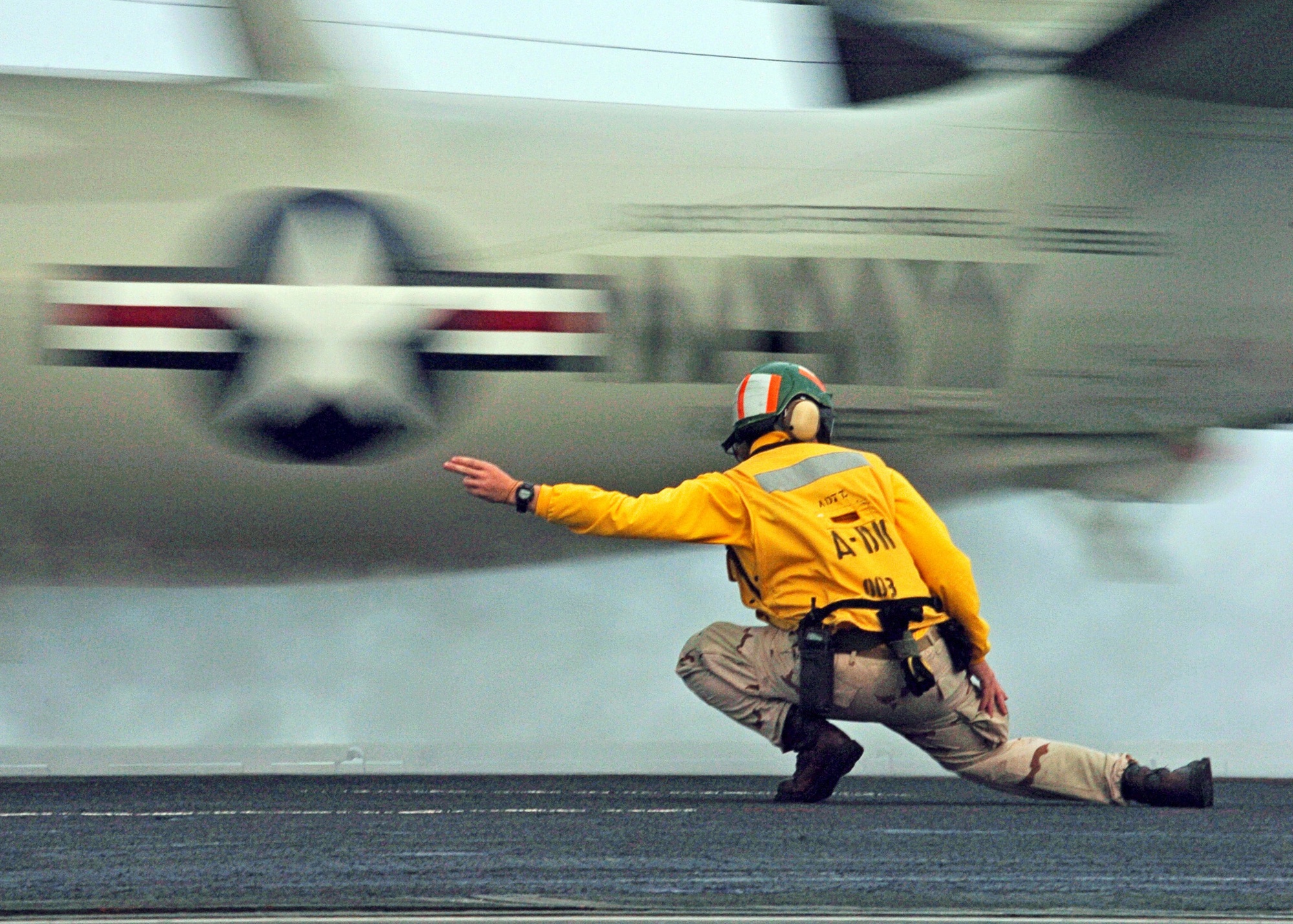 DVIDS - Images - Navy Lt. j.g. Tracey Mackey signals the