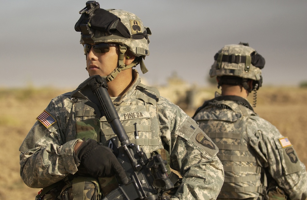 U.S. Army Pvt. Joseph Pineda provides rear security.