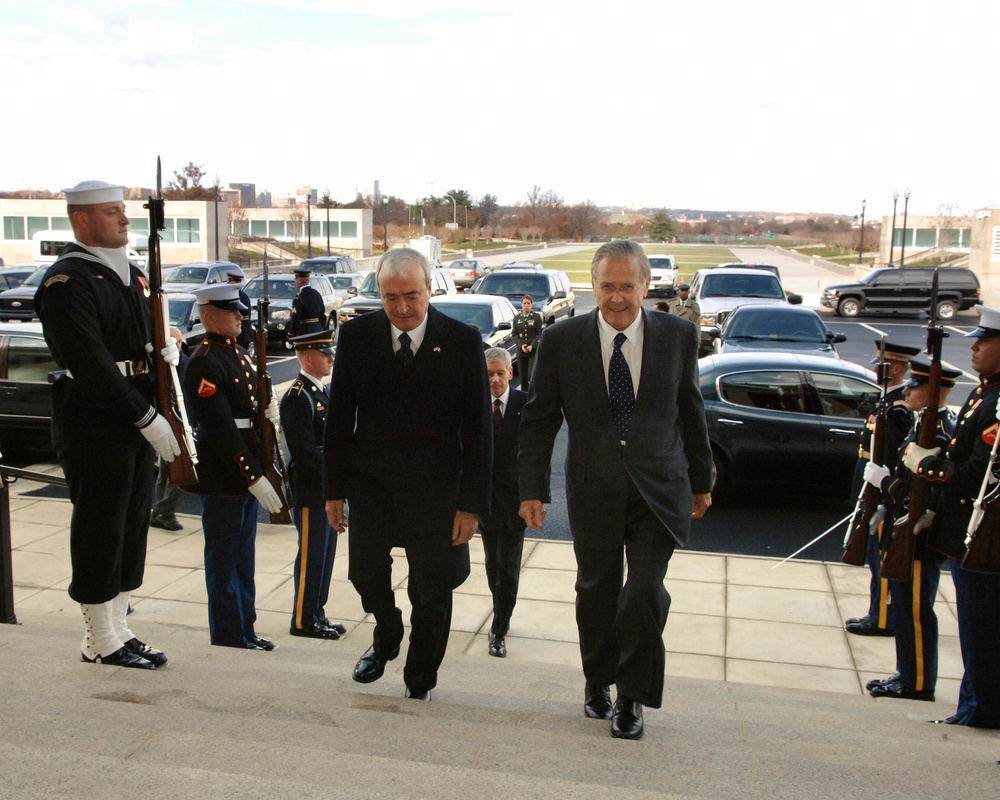 Secretary Rumsfeld escorts Italian Minister of Defense Antonio Martino into the Pentagon.