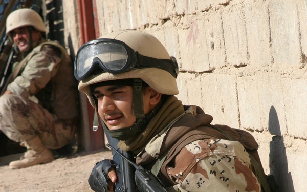 An Iraqi Army soldier watches for suspicious activity.
