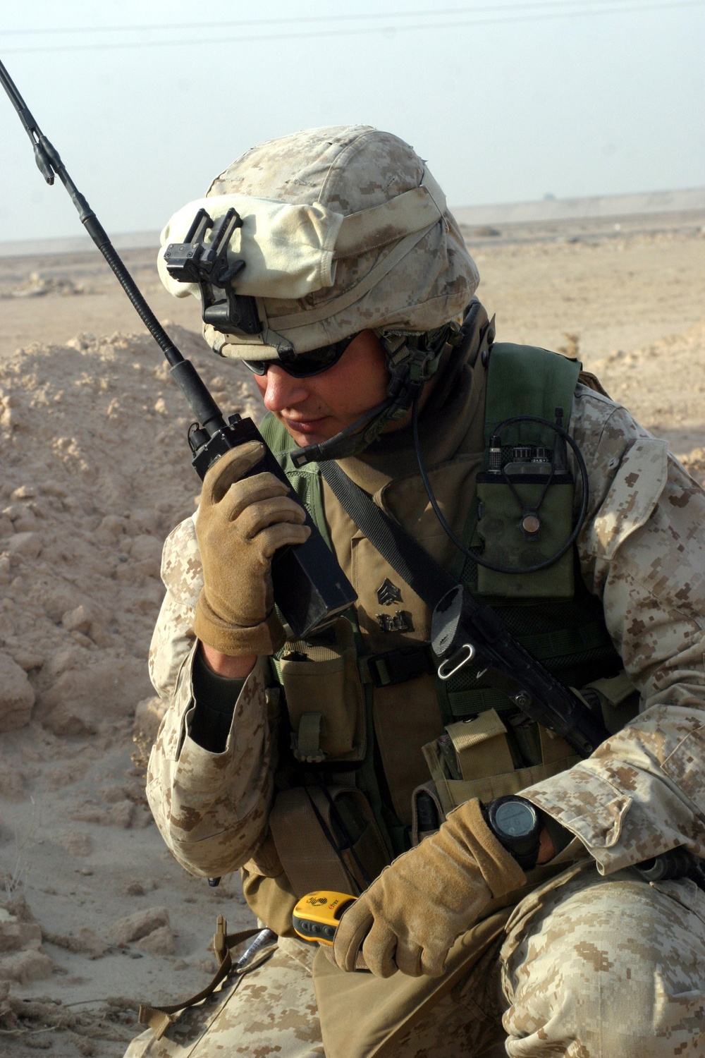 Marine Sgt. Brandon Shofne radios into headquarters.