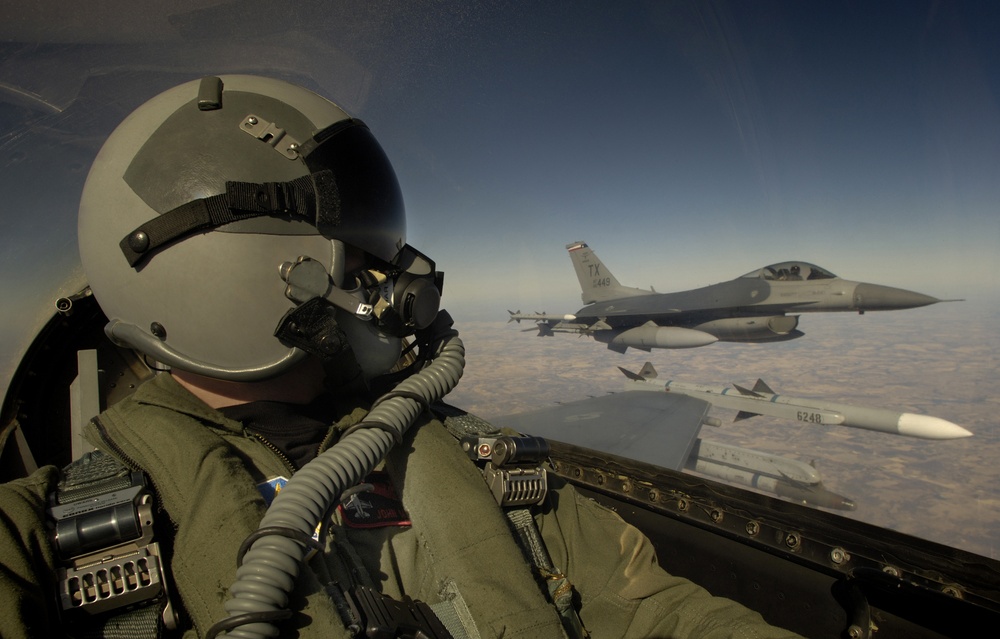 Two U.S. Air Force F-16C Fighting Falcons conduct tactical training.