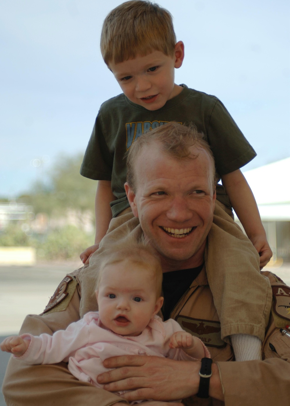Air Force Maj. Jon Culp has a happy reunion with his children.