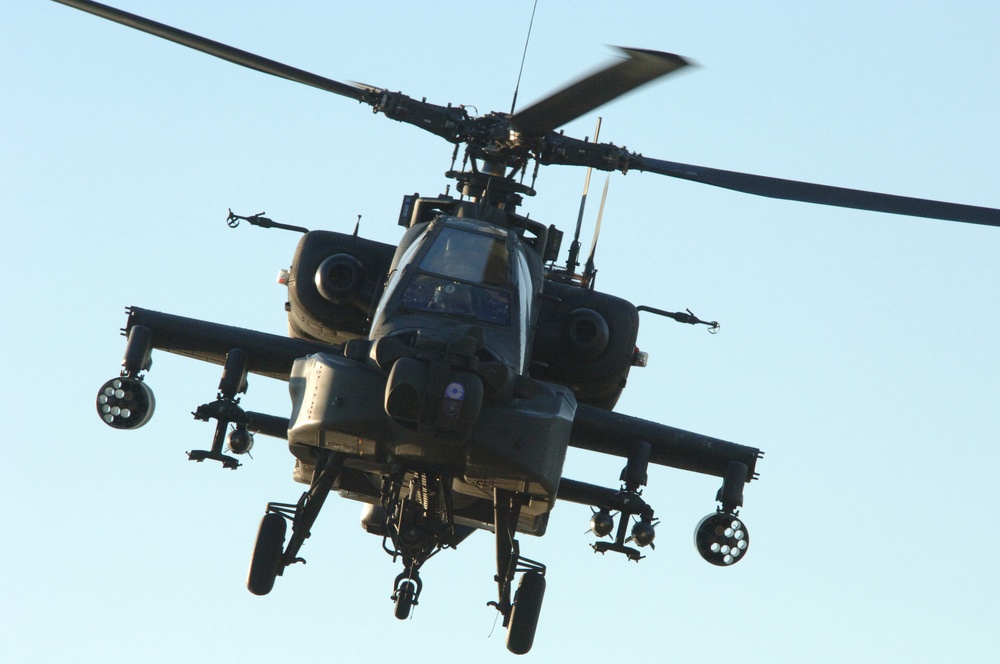 An Army AH-64 Apache helicopter provides air support for U.S. Army soldiers.