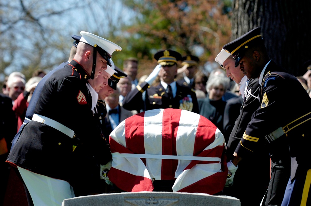 The joint service honor guard places the casket of former Secretary of Defense Caspar W. Weinberger.