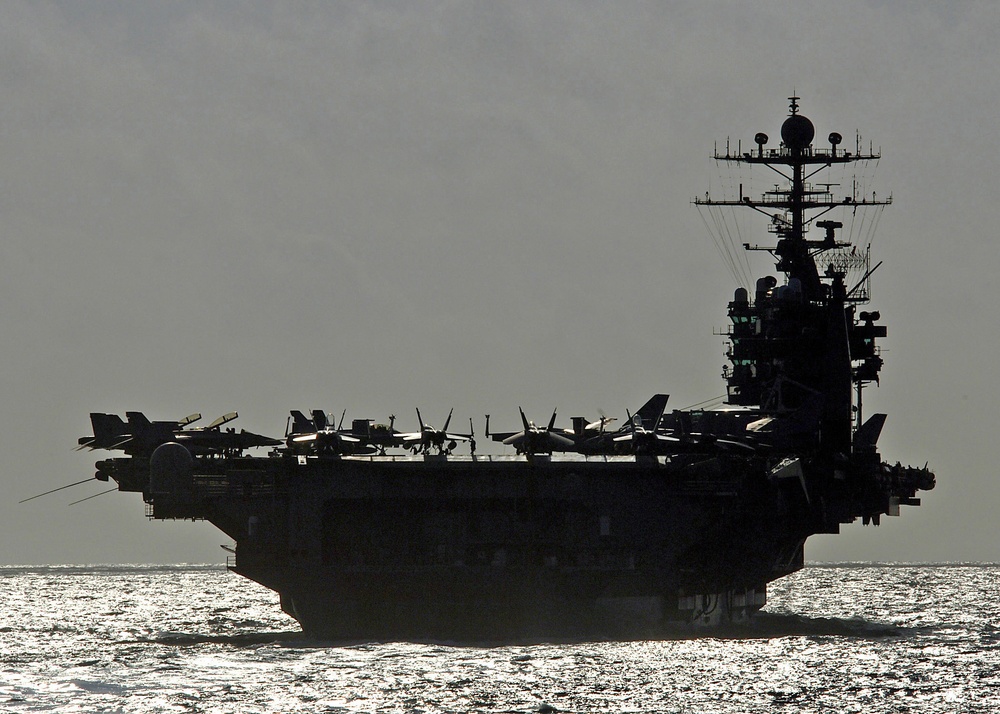 The aircraft carrier USS George Washington (CVN 73) prepares to conduct a refueling at sea.