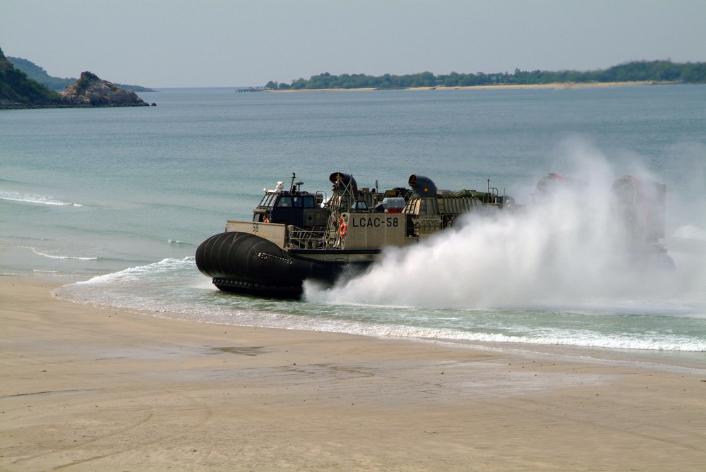 A landing craft air cushion lands on a beach in Hat Yao, Thailand.