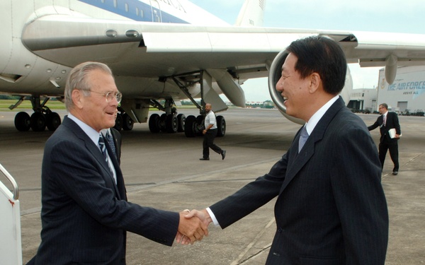 Singapore's Minister of Defense Teo Chee Hean greets Secretary Rumsfeld.
