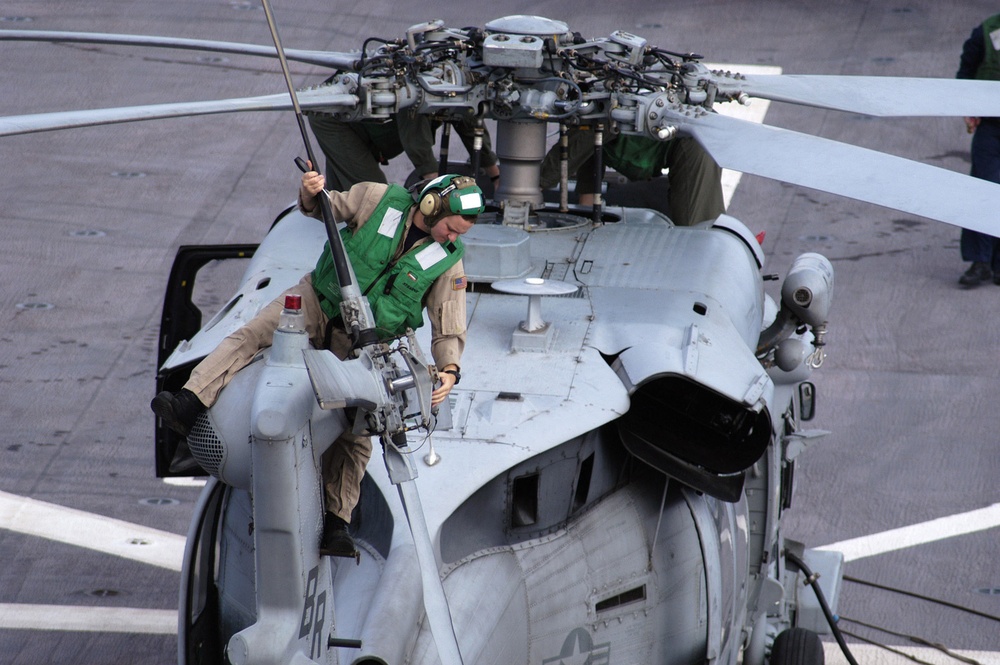 DVIDS - Images - Petty Officer 1st Class Dave Brusby performs preflight ...