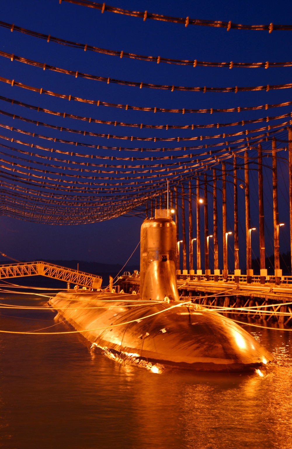 The USS Jimmy Carter (SSN 23) sits moored in the magnetic silencing facility.