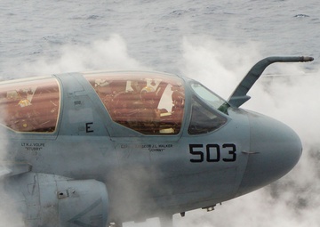An EA-6B Prowler aircraft prepares to launch from one of the four steam-powered catapults.