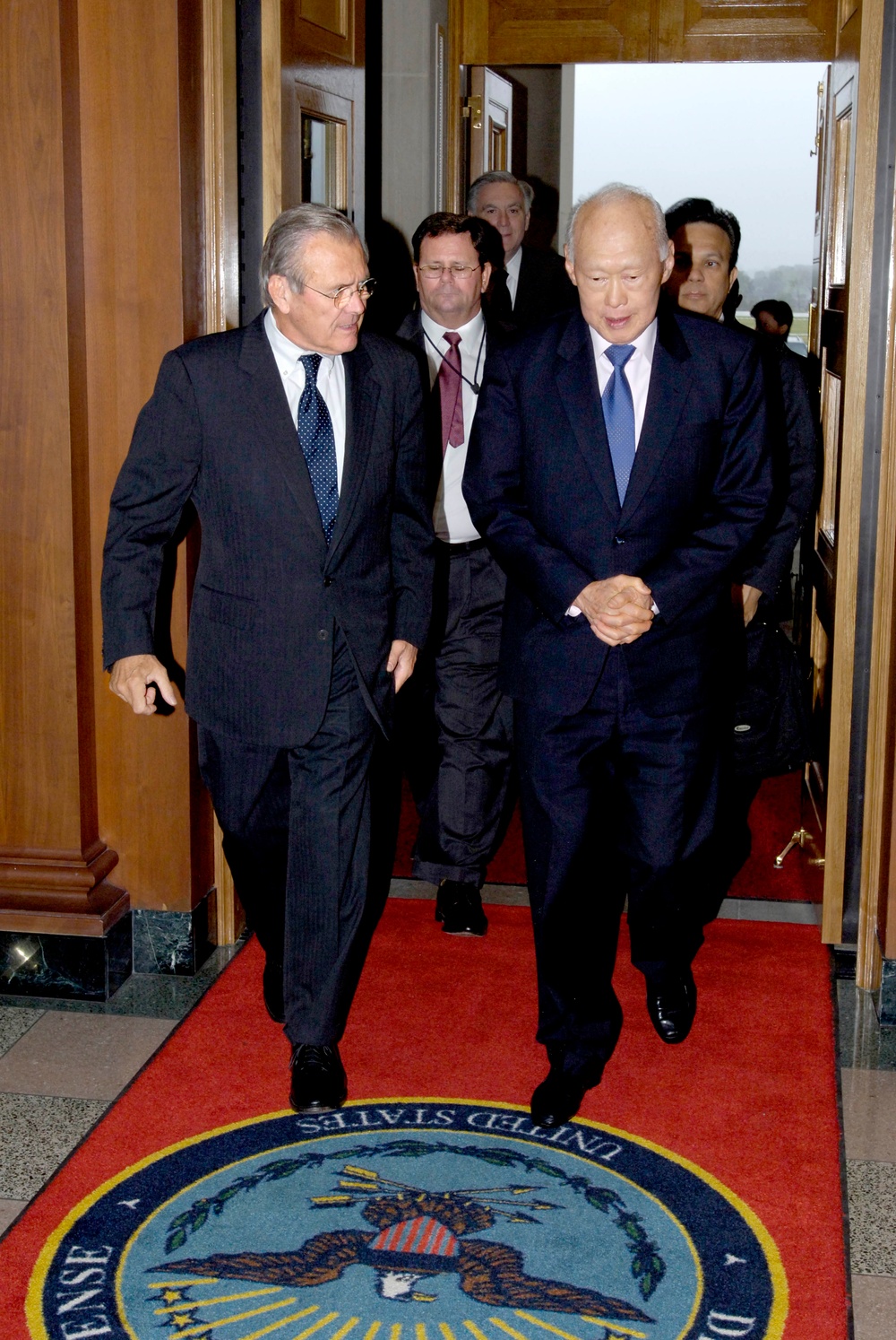 Secretary  Rumsfeld escorts Singapore's Minister Mentor Lee Kuan Yew into the Pentagon.