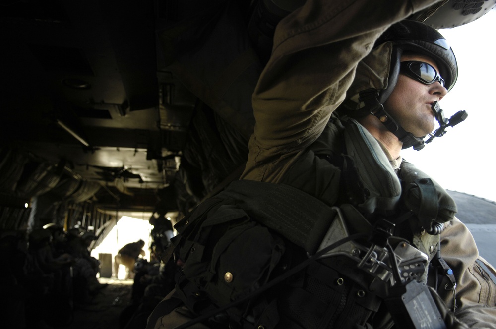 U.S. Navy Petty Officer 1st Class Joe Cox scans the skies.