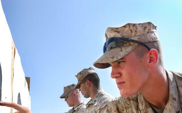 Marine Lance Cpl. Derek Roberts adds his score.