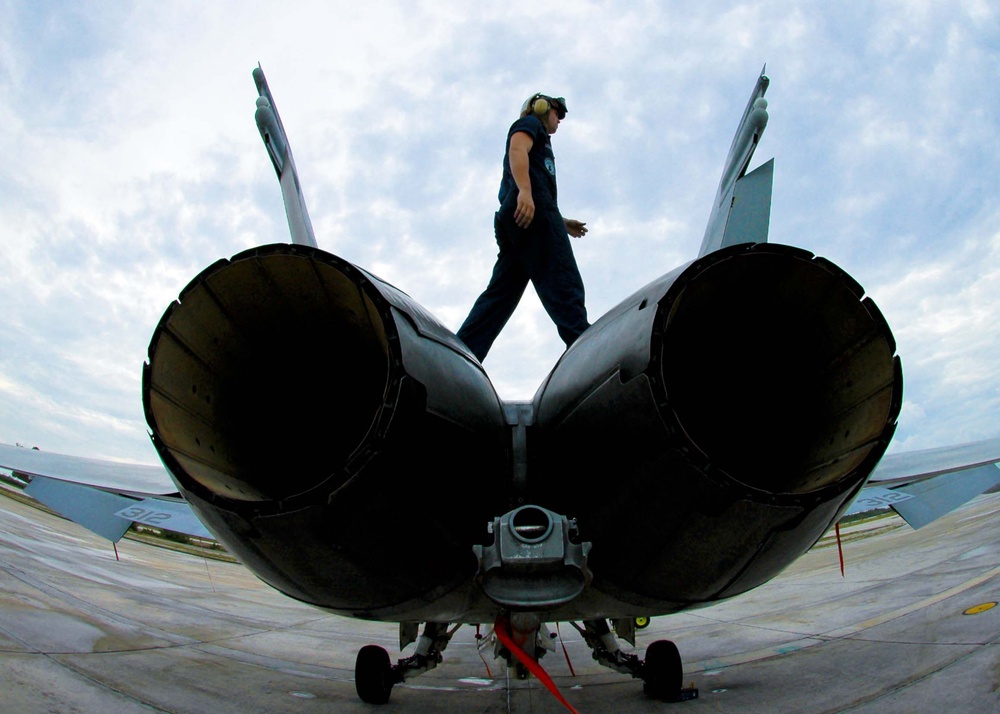 Airman Robert Leggett performs a routine turnaround inspection.