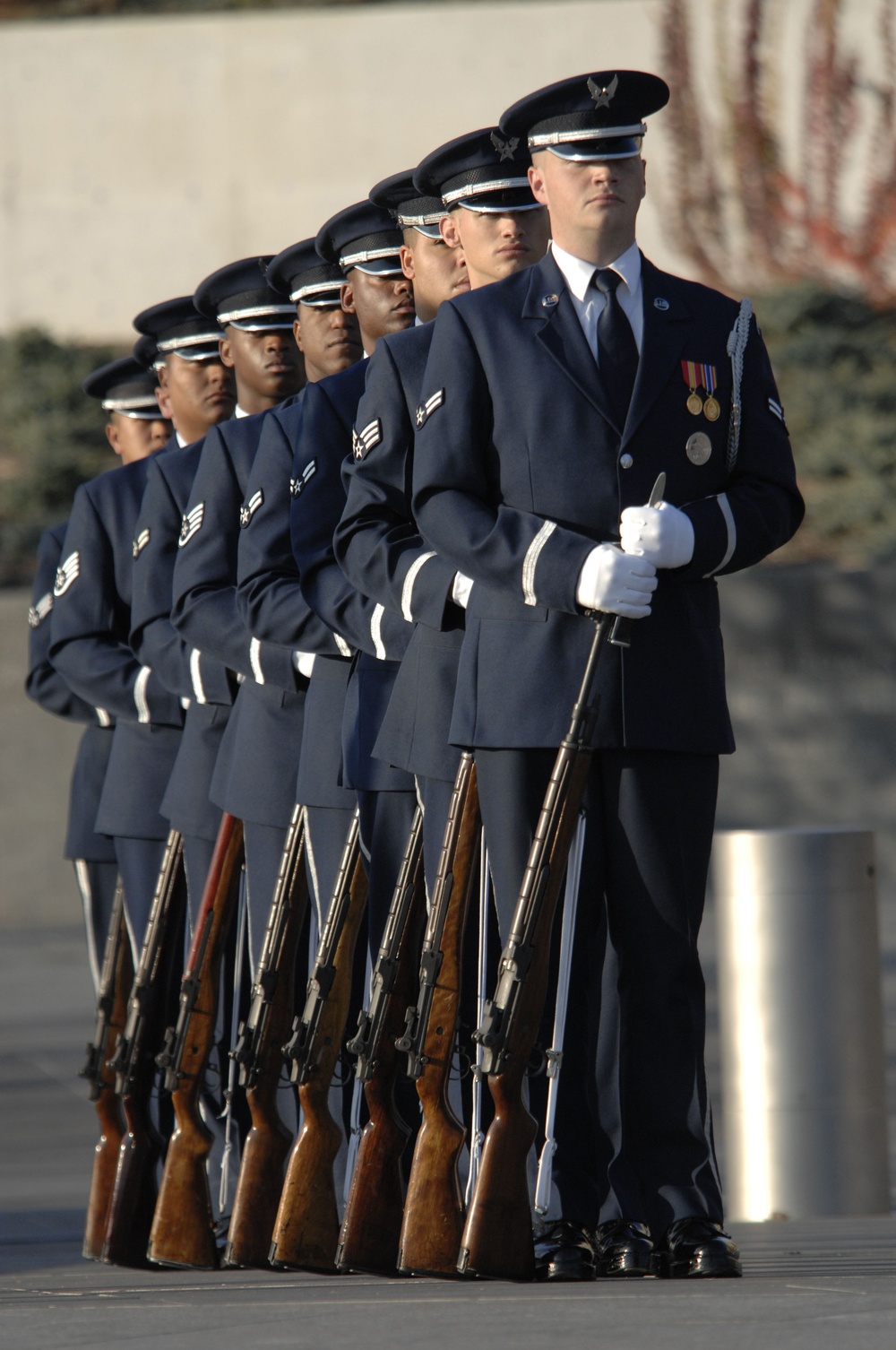 U.S. Air Force honor guardsmen stand in formation.