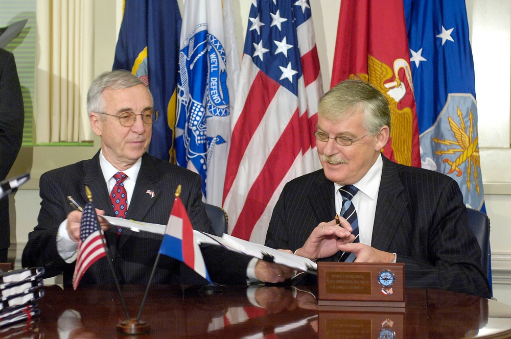 Deputy Secretary England passes a Memorandum of Understanding on the Joint Strike Fighter program.