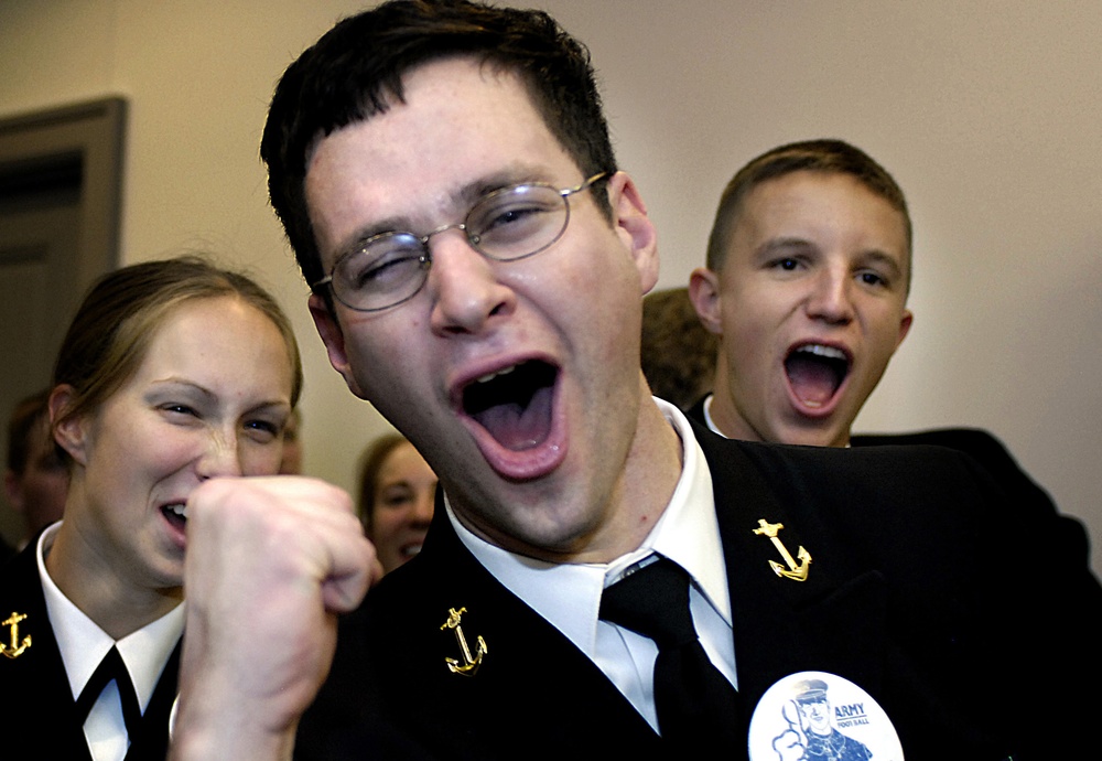 U.S. Naval Academy cadets cheer during a Navy pep rally.