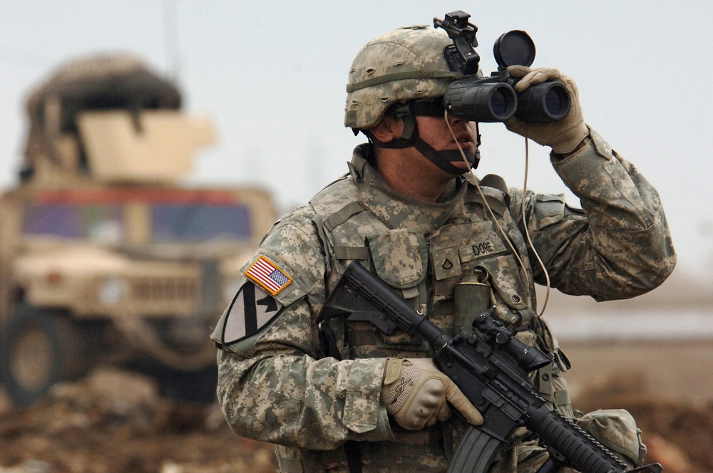 Pfc. Jason Dore looks for any possible enemy contact.